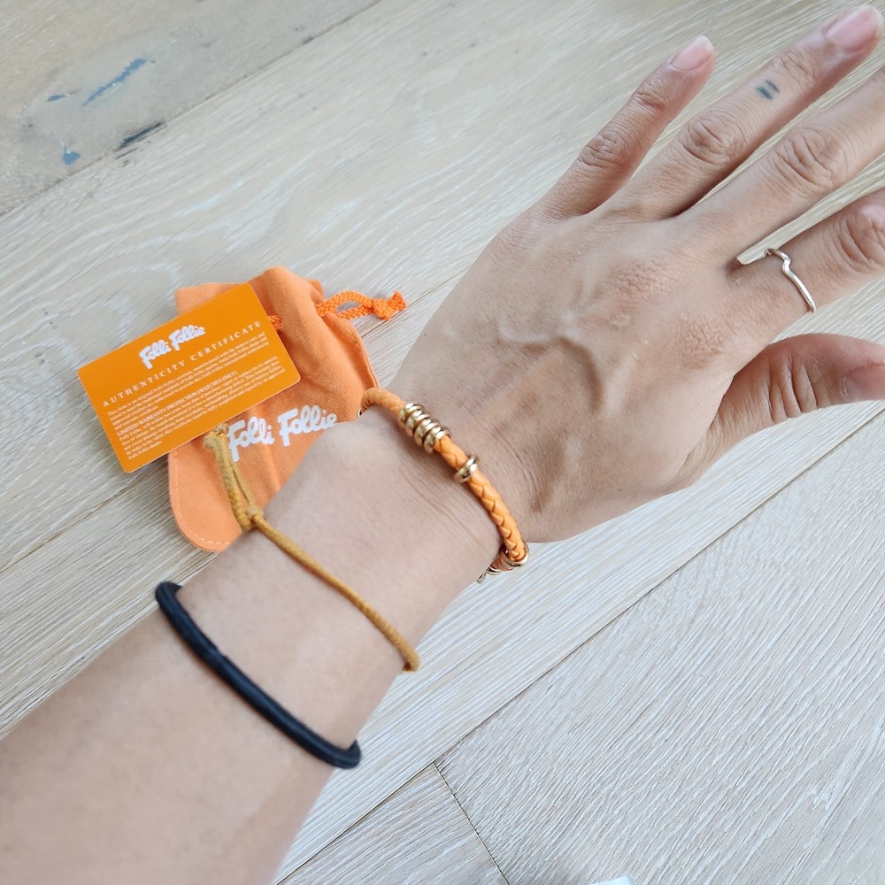 Folli Follie orange leather bracelet with gold accent